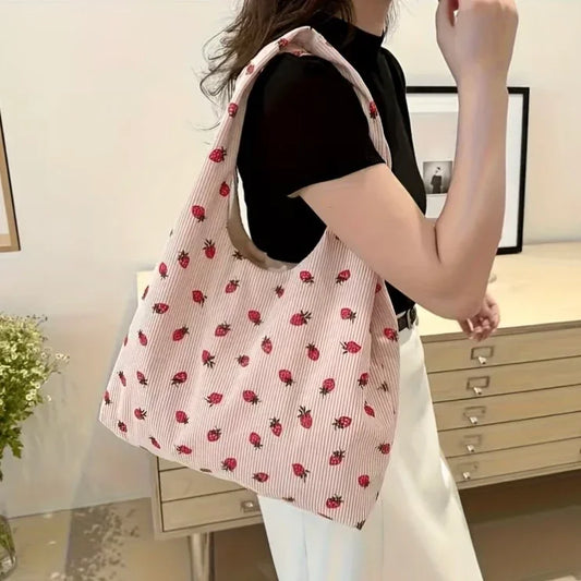 Pink strawberry-patterned corduroy fabric from Kxh Official Store, showcasing soft textured material and vibrant design.