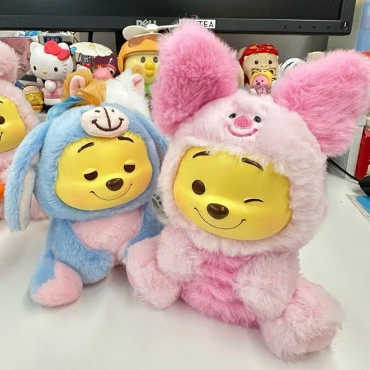 Winnie the Pooh keychain featuring a cute plush figure attached to a metal keyring, perfect for bags or keys.
