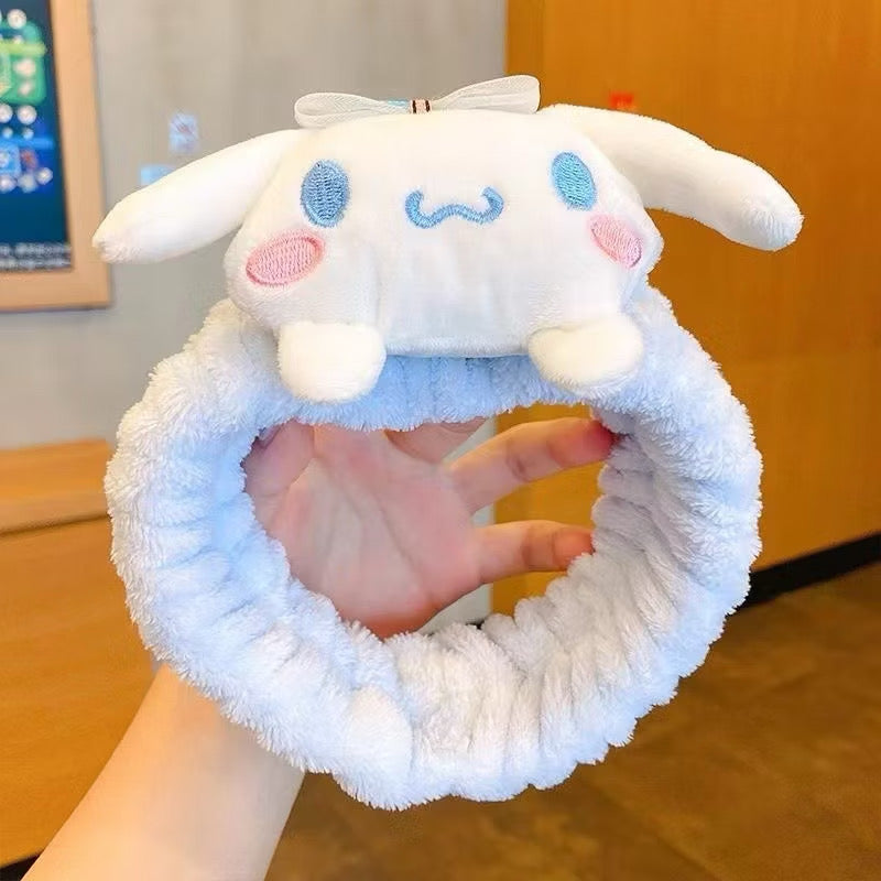 Sanrio headband with colorful character designs, featuring a plush fabric band perfect for accessories and casual wear.
