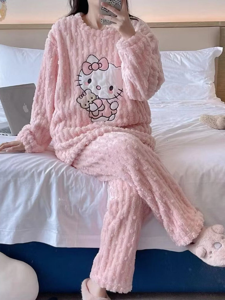 Pink marshmallow flannel Hello Kitty pajama set featuring a cute Hello Kitty design on soft, cozy fabric.