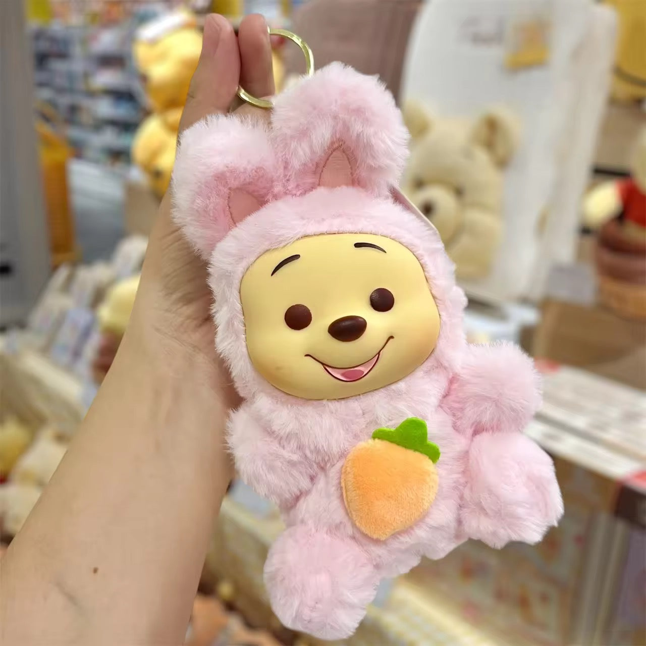 Winnie Pooh keychain by Kxh Official Store featuring a cute Pooh bear charm attached to a metal keyring