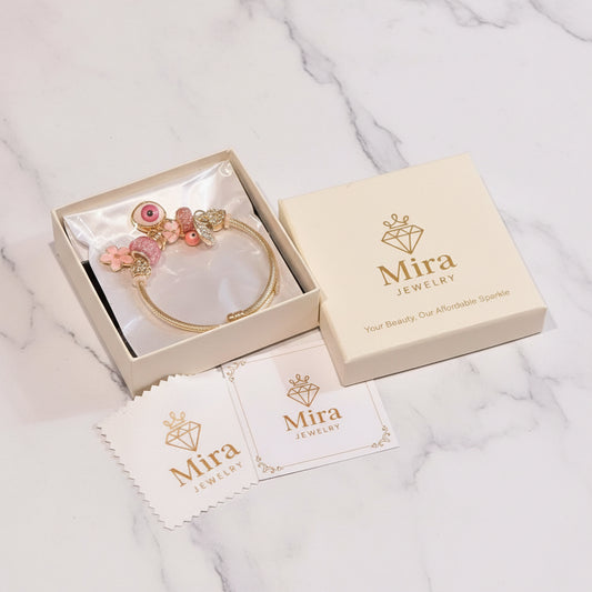 Elegant Mira Jewelry piece featuring intricate details and a sleek design, showcased in a close-up image.