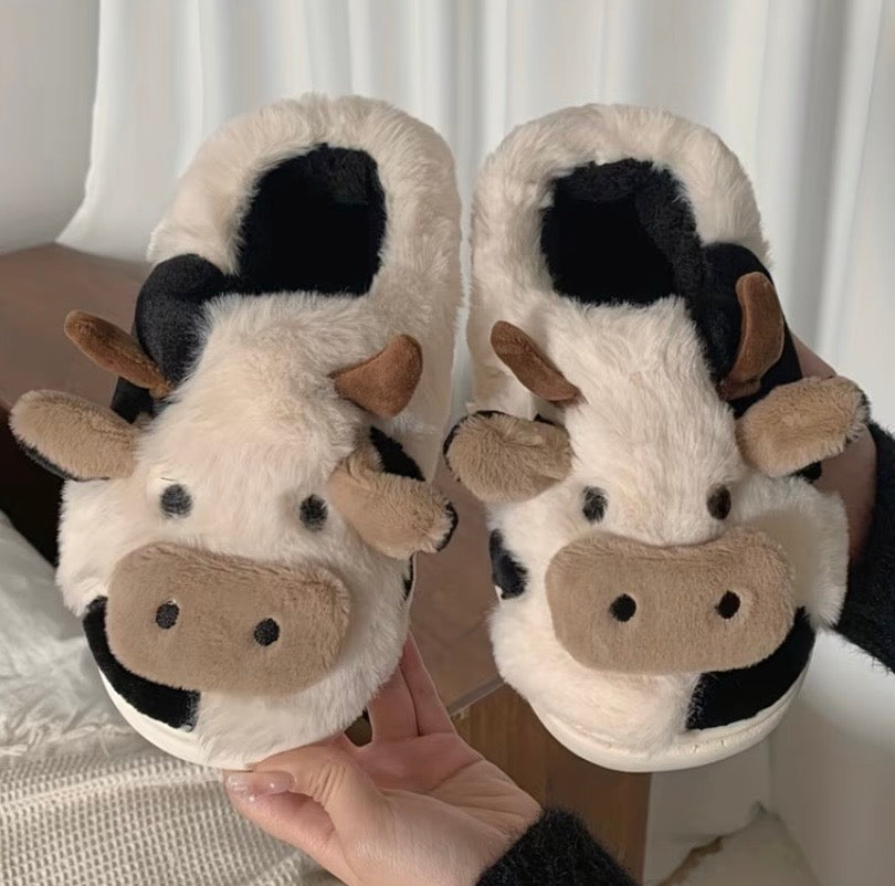 Kxh Official Store cow slippers featuring soft plush material and realistic cow face design for cozy indoor wear
