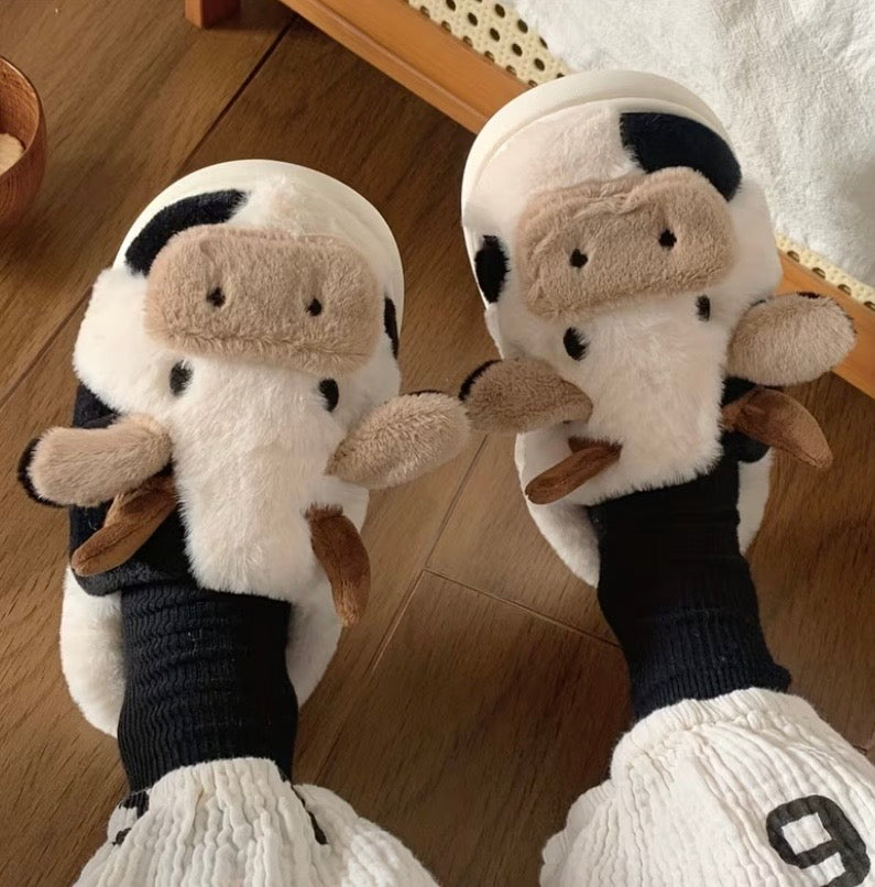 Kxh Official Store cow slipper featuring soft plush material and detailed cow design for comfortable indoor wear