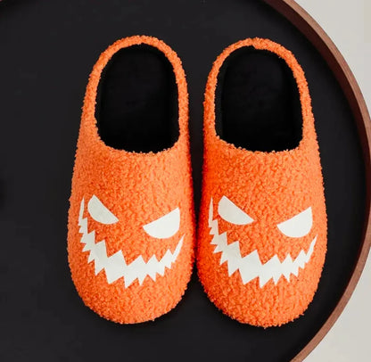 Glowing Halloween slippers from Kxh Official Store featuring spooky illuminated designs on soft fabric slippers.
