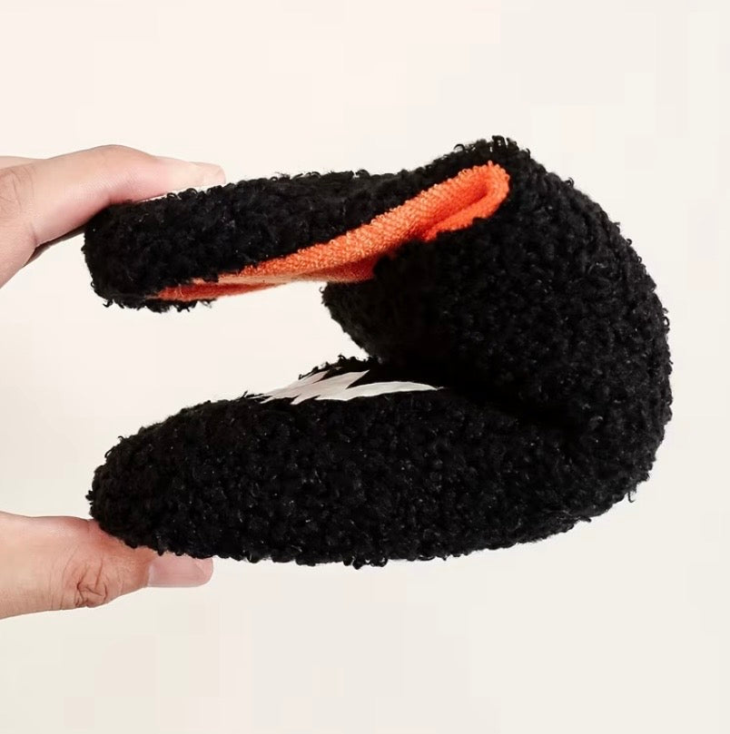 Glowing Halloween slippers by Kxh Official Store featuring spooky designs and soft fabric for festive comfort.