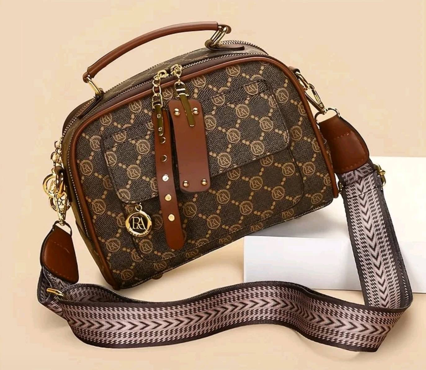 Dark Aria Classic Crossbody bag by Kxh Official Store featuring a sleek design and adjustable strap.