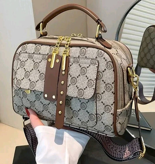 Dark Aria Classic Crossbody bag by Kxh Official Store, featuring a sleek design with adjustable strap and stylish hardware.