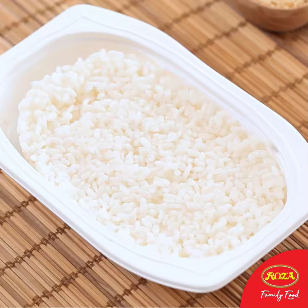Steamed jasmine rice in a bowl, showcasing fluffy, fragrant grains from Kxh Official Store's Roza prompt jasmine rice.