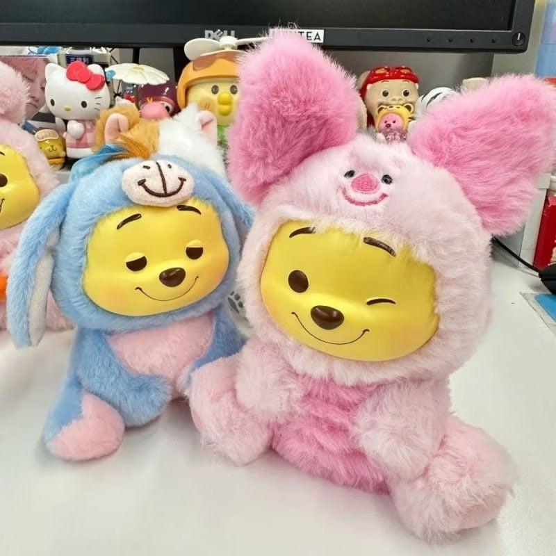 Winnie the Pooh keychain featuring a cute plush figure attached to a metal keyring, perfect for bags or keys.