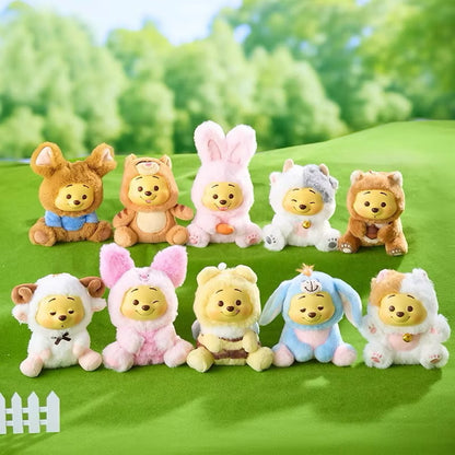 Winnie the Pooh keychain featuring a cute plush charm with a smiling face, attached to a metal keyring, by Kxh Official Store.