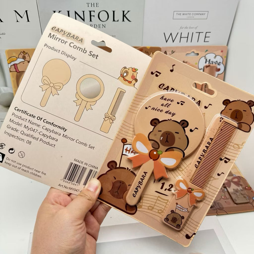 Capybara mirror comb set from Kxh Official Store, featuring a cute capybara design and two grooming combs for hair styling.