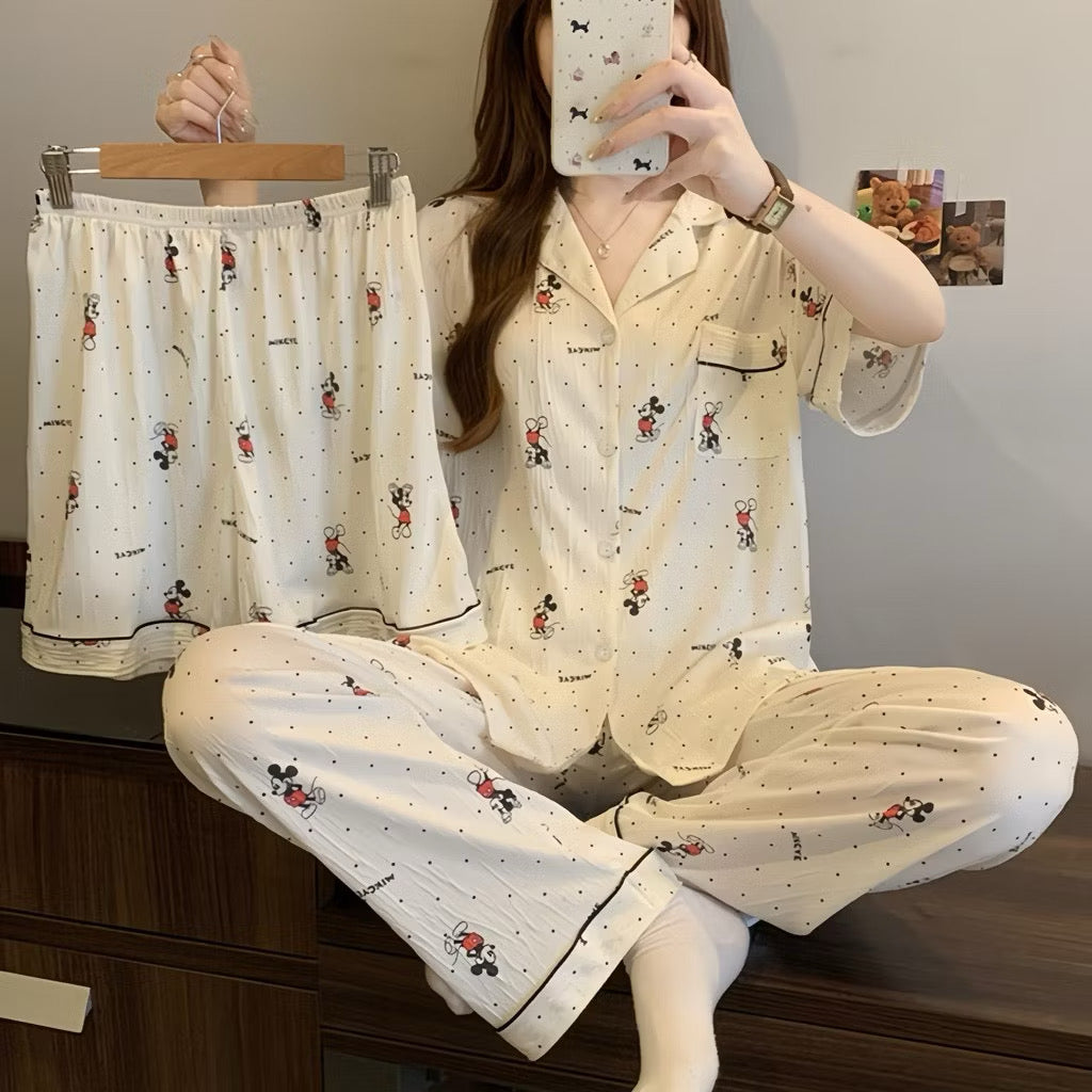 Sanrio pajama set with three pieces from Kxh Official Store, featuring colorful cartoon character prints and cozy fabric.