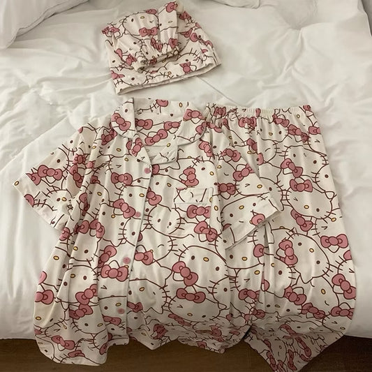 Kxh Official Store Sanrio pajama set with three pieces, featuring colorful cartoon characters on soft, comfortable fabric.