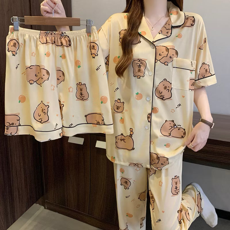Sanrio pajama set by Kxh Official Store featuring three-piece sleepwear with colorful cartoon character prints.