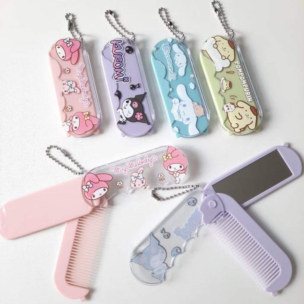 Sanrio Kuromi 2-in-1 compact comb and mirror keychain by Kxh Official Store, featuring cute black and pink design with character details.
