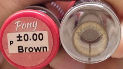 Close-up of clear contact lenses in a small container, showcasing the Kxh Official Store brand for eye vision correction.