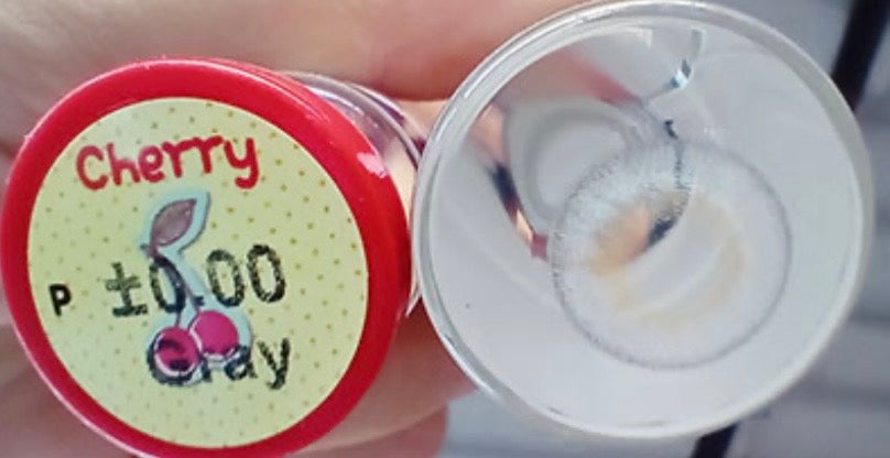 Close-up of clear contact lenses from Kxh Official Store, showing the smooth, transparent lens design on a white background.