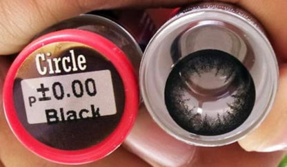 Close-up of Kxh Official Store contact lenses in a clear lens case, showcasing the lens details and packaging.