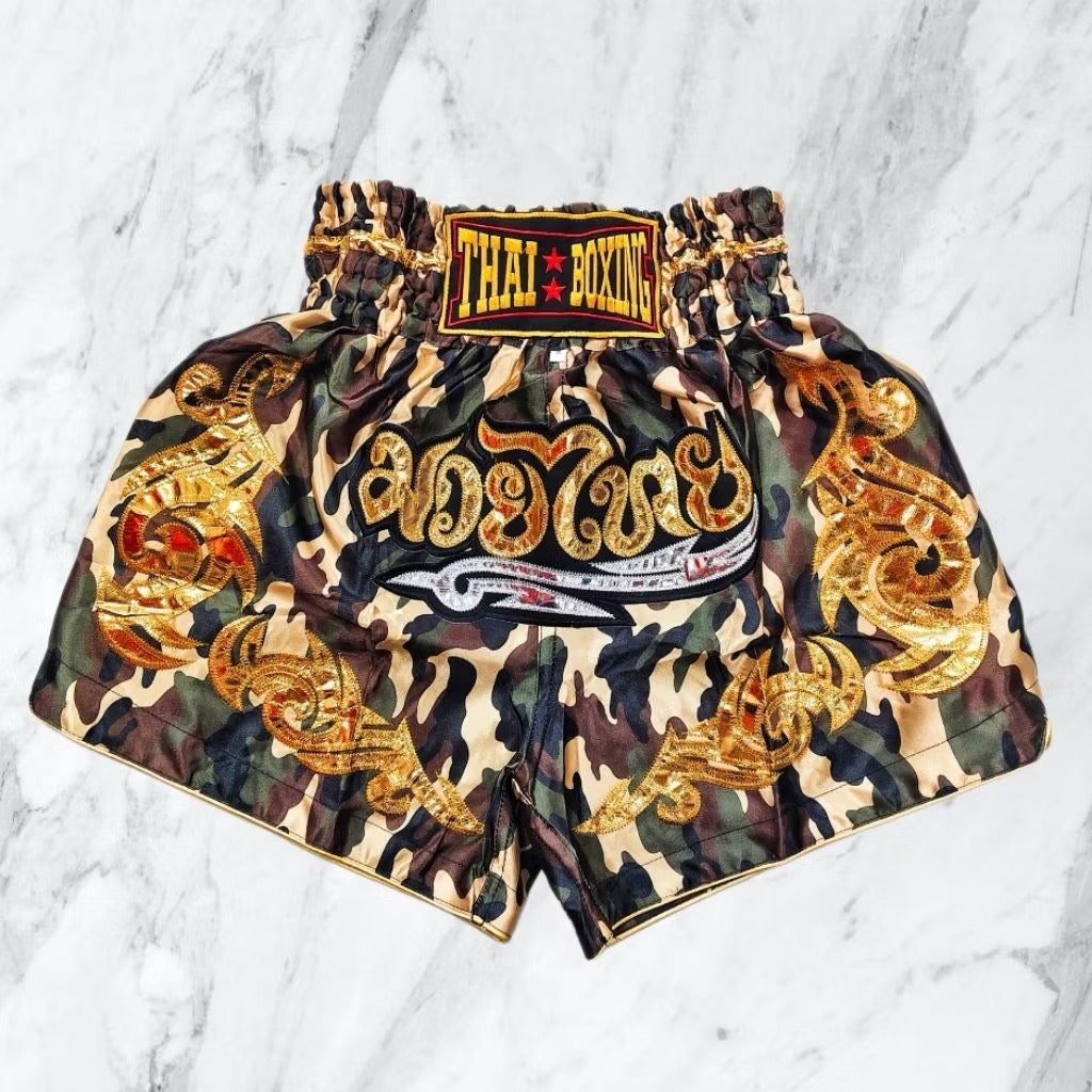 Pink Kid Muay Thai shorts by Kxh Official Store, featuring vibrant design and comfortable fit for young martial artists.