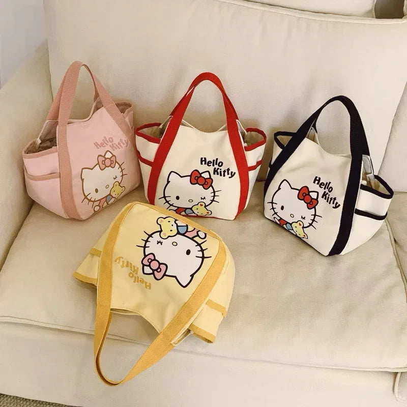 Pink Hello Kitty canvas mini tote bag by Kxh Official Store with cute character print and compact design.