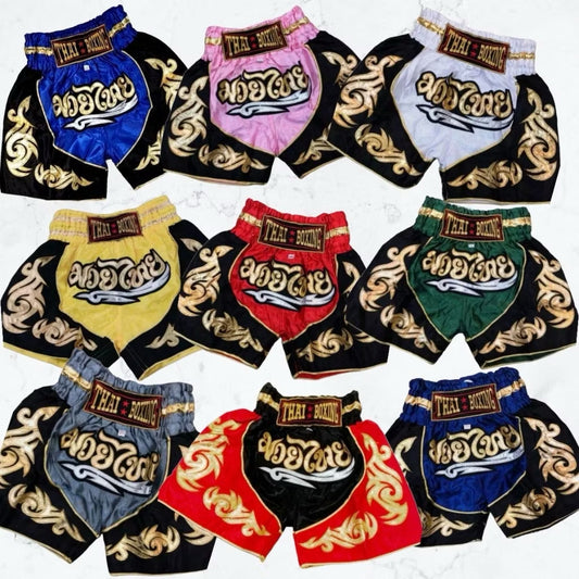 Pink adult Muay Thai shorts by Kxh Official Store with elastic waistband and bold design, suitable for training and martial arts.