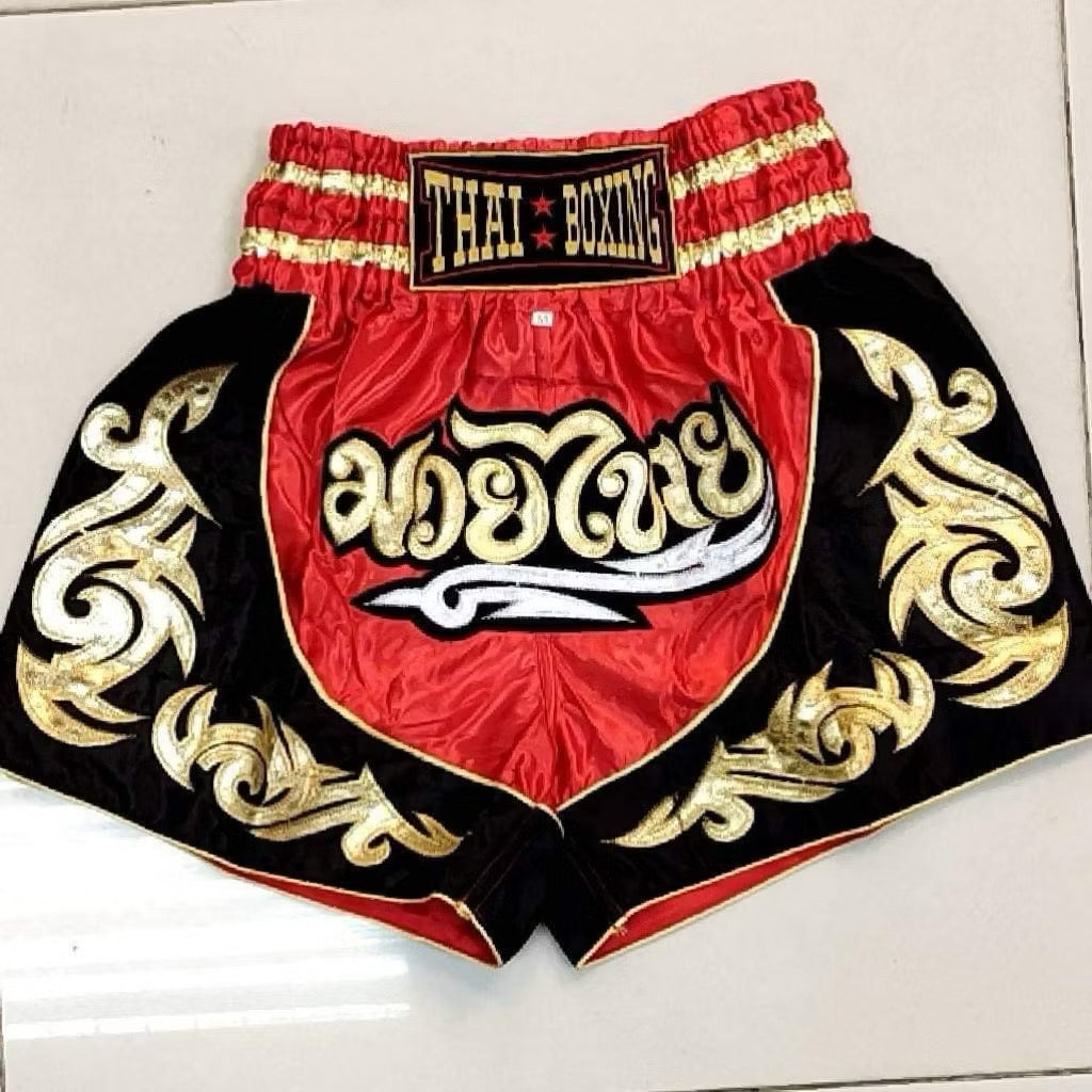 Pink adult Muay Thai shorts by Kxh Official Store with elastic waistband and martial arts design.