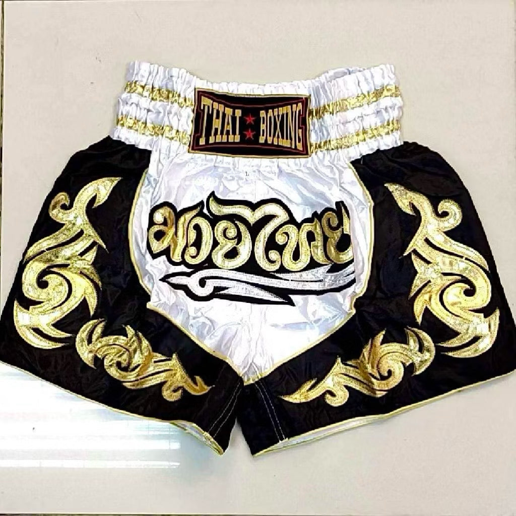 Pink adult Muay Thai shorts by Kxh Official Store, lightweight fabric with bold design and comfortable fit for martial arts.