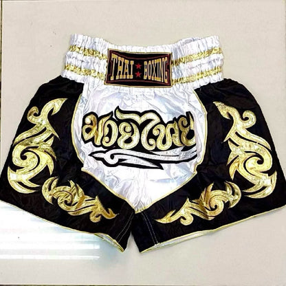 Pink adult Muay Thai shorts by Kxh Official Store, lightweight fabric with bold design and comfortable fit for martial arts.